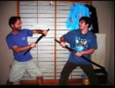 father son mock duel with authentic Japanese swords