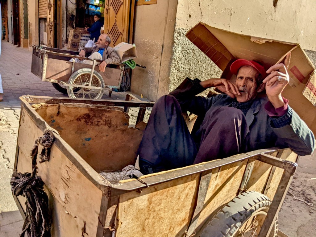 man taking a rest, Ouled Tiema, Morocco
