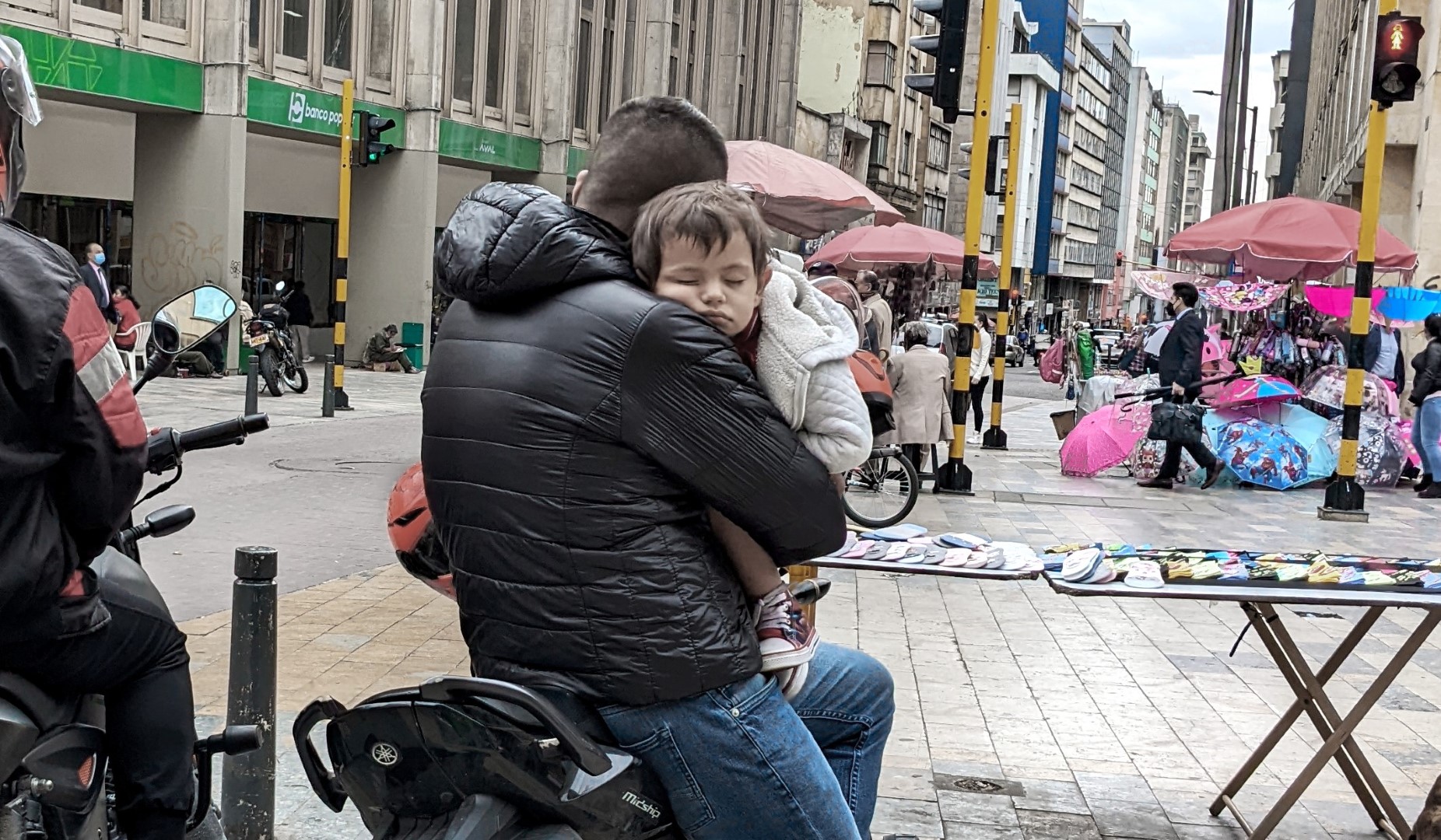 sleeping on dad's shoulder, Bogota, Columbia
