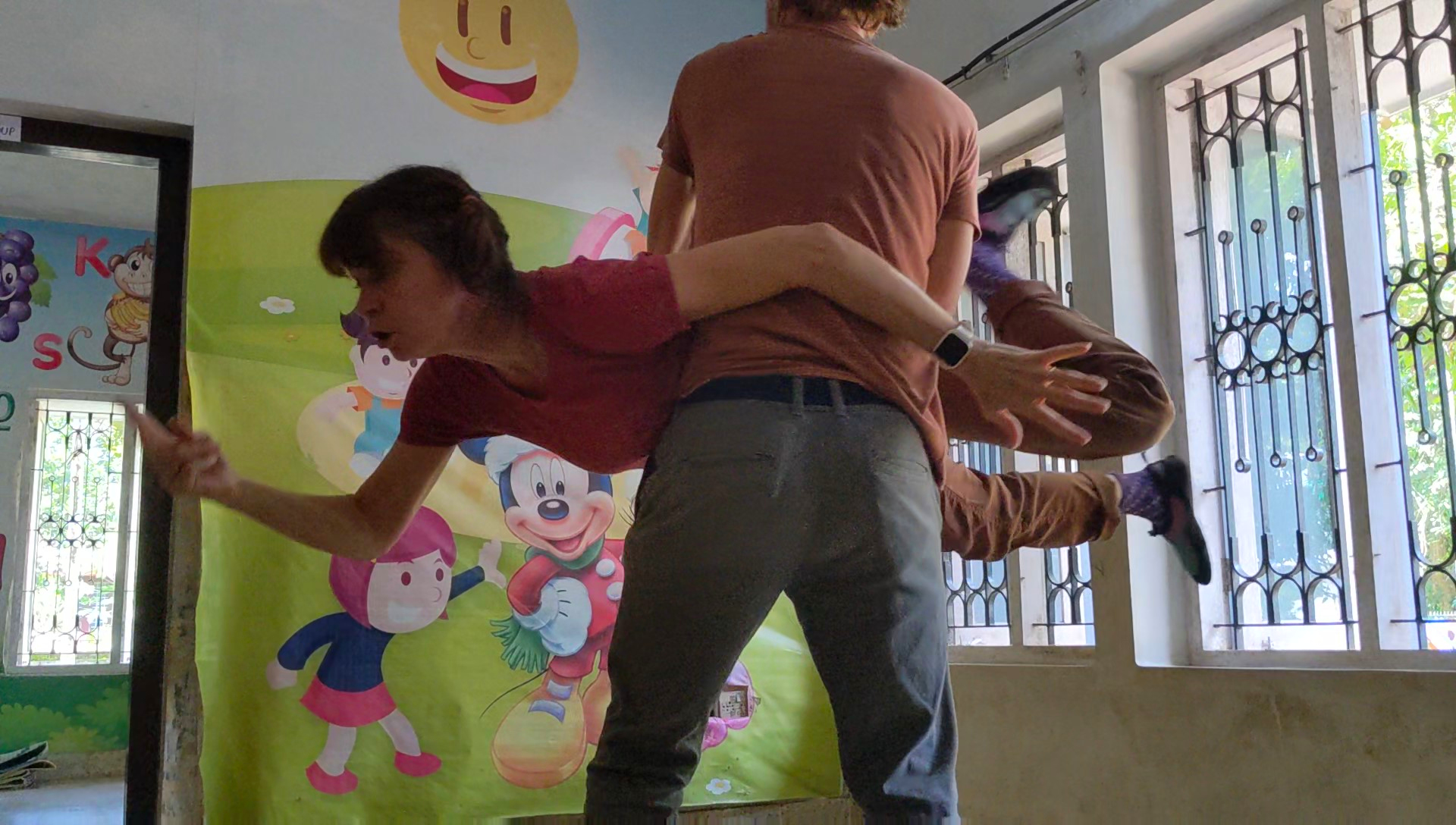 Performing a story for students as part of our volunteer job through WorkAway