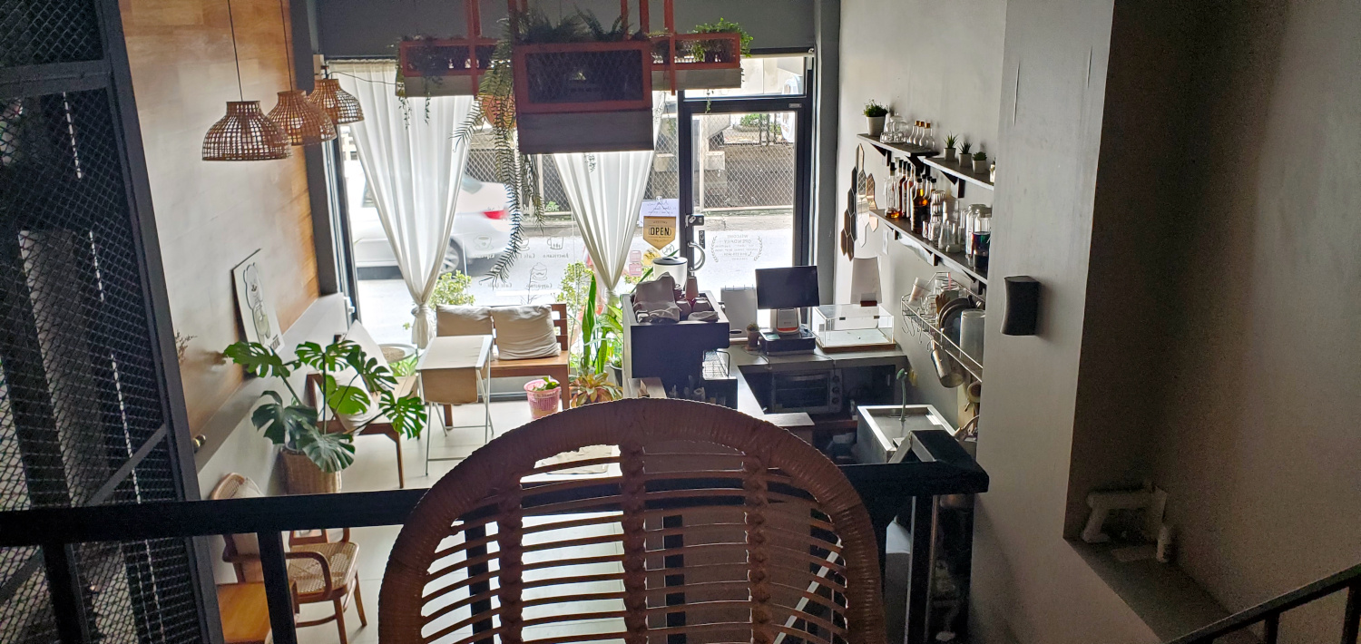 inside the lobby/cafe of an AirBnB in Bangkok, Thailand