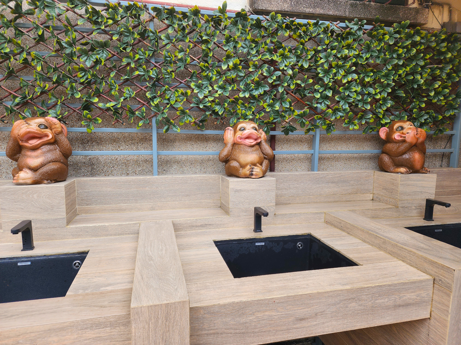 see no, hear no, speak no monkeys watching over the handwashing sinks at Golden Mount