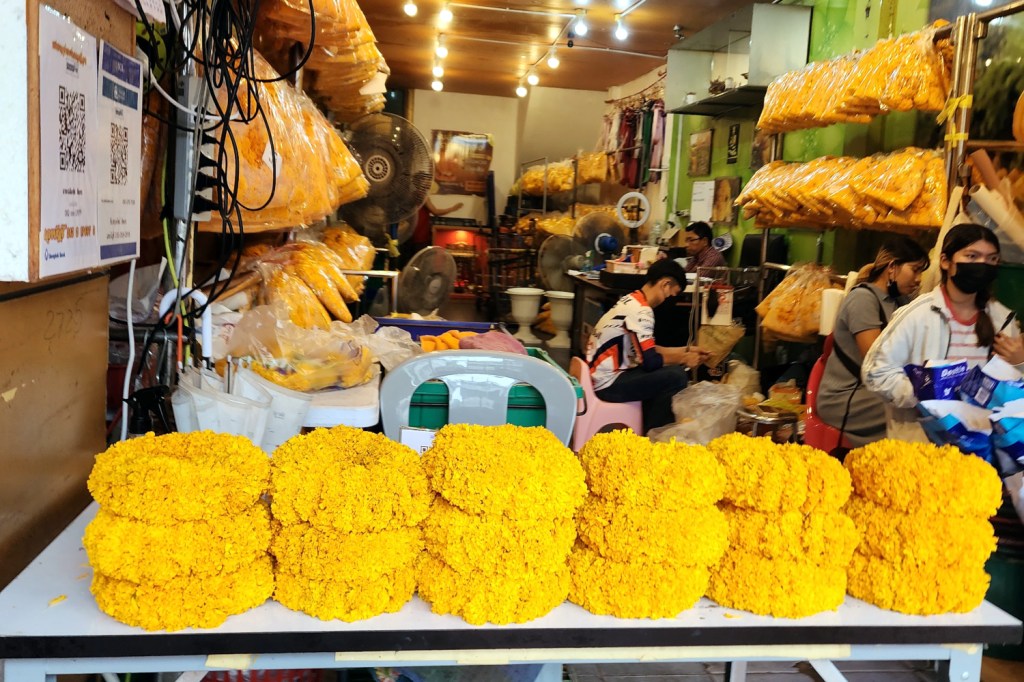shop preparing floral wreaths Bangkok, Thailand