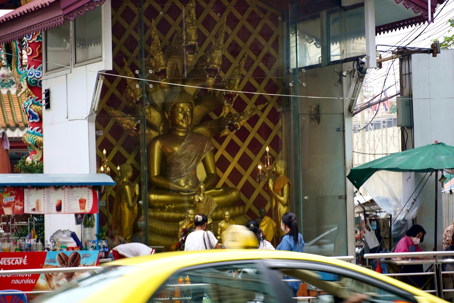 shrines dedicated to deities adorn the streets in Bangkok