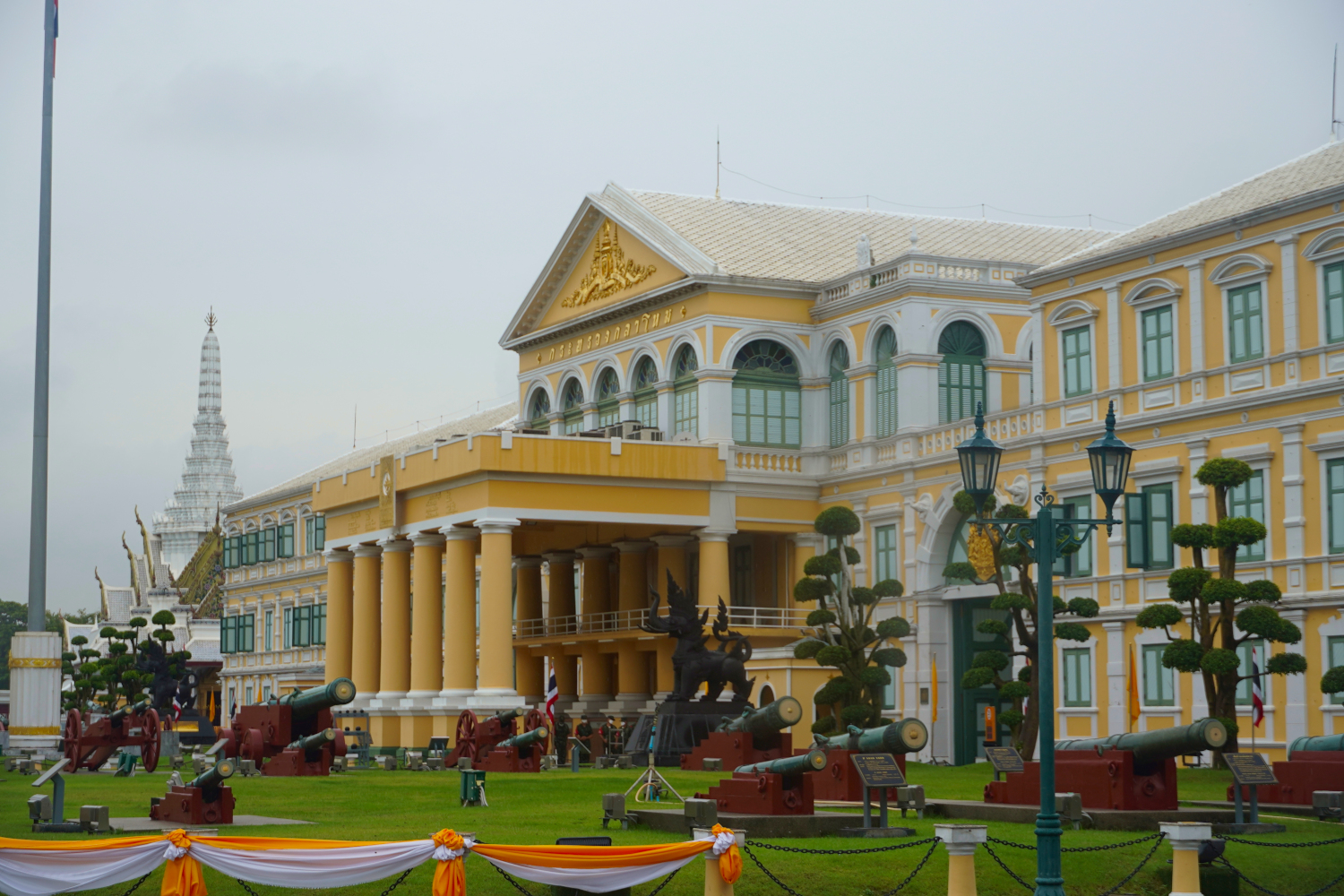 cannons, trees, yellow building Ministry of Defense, Bangkok, Thailand