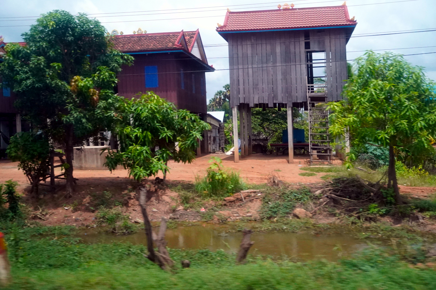 traditional housing on stilts above the flood plain