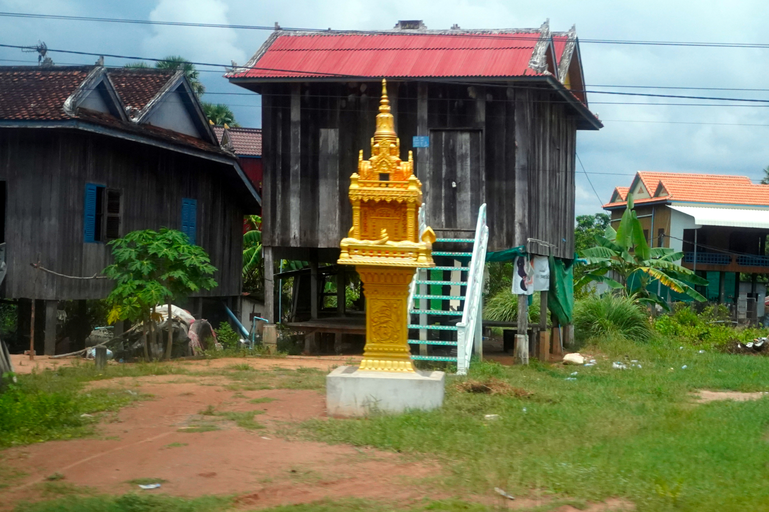 golden prayer pagoda along the road to Siem Reap