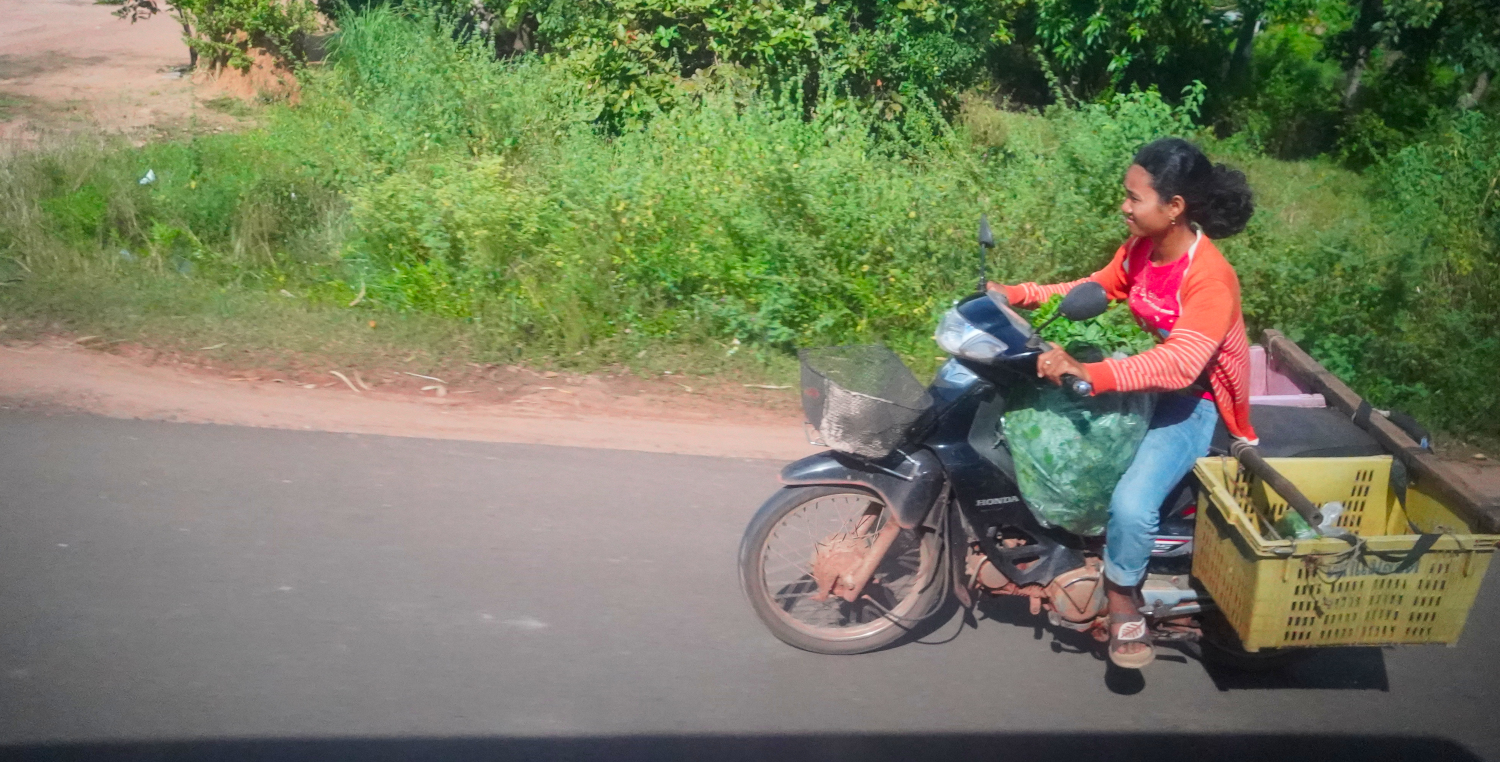 passing a motorist on the way to Siem Reap