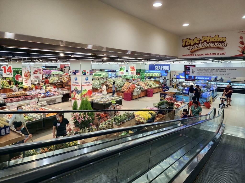 supermarket with escalator and a large selection of international food - Vietnam