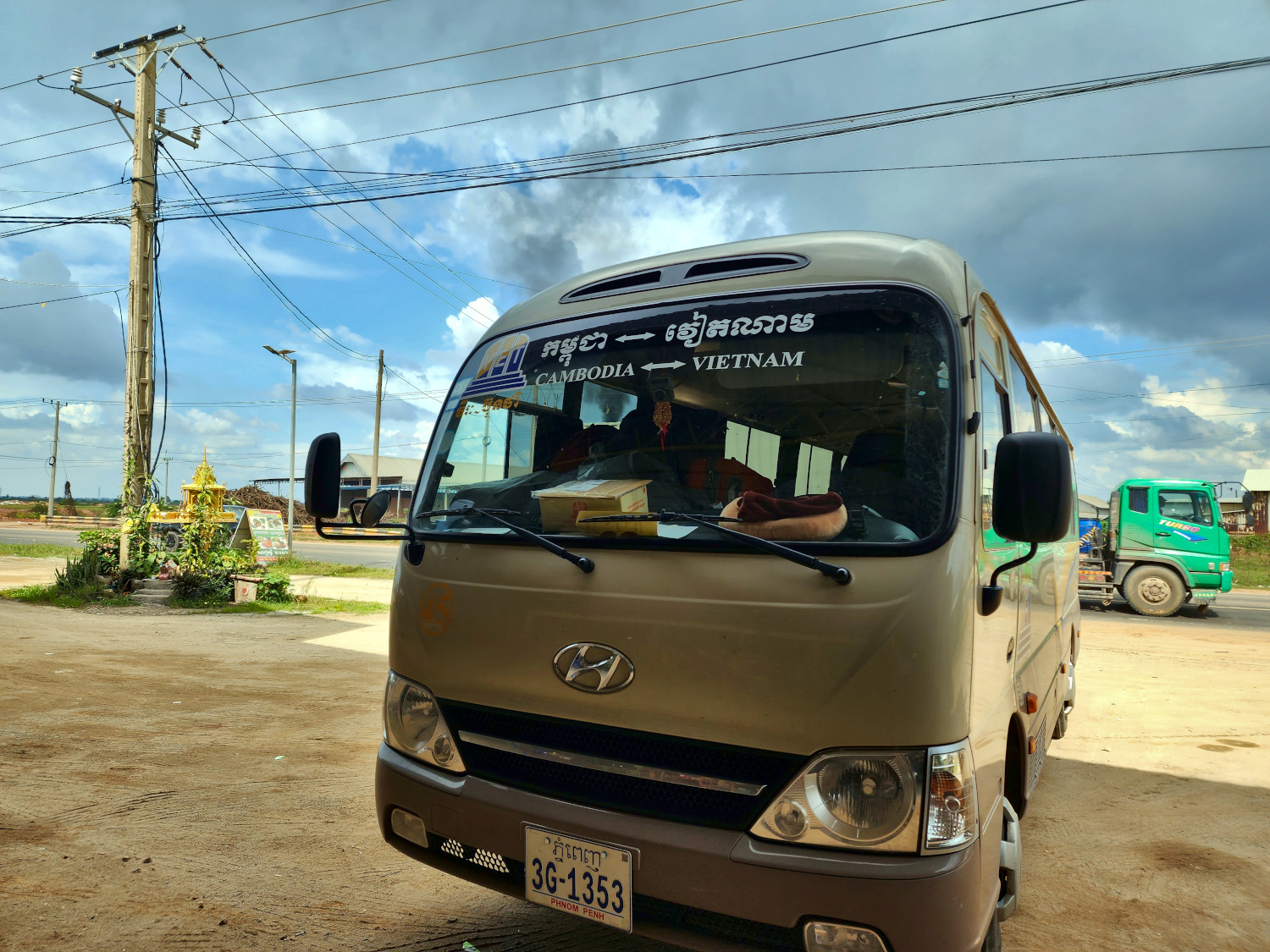 14 passenger van at rest stop - Vietnam to Cambodia