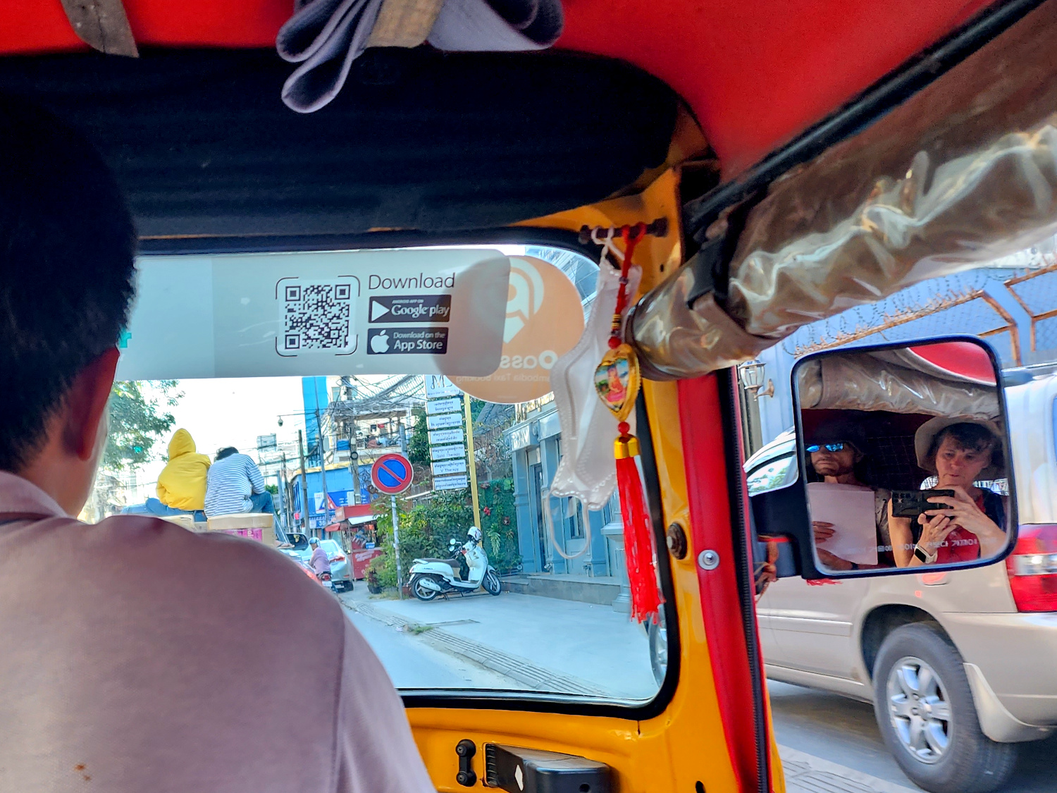 riding in a tuk tuk, volunteering in Phnom Penh