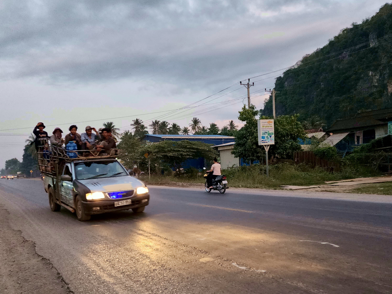workers commuting in Phnom Sampov, Cambodia