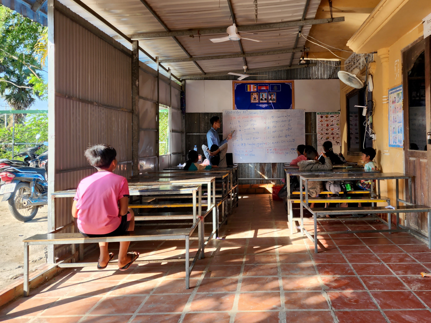 lesson time in open air classroom Phnom Sampov, Cambodia