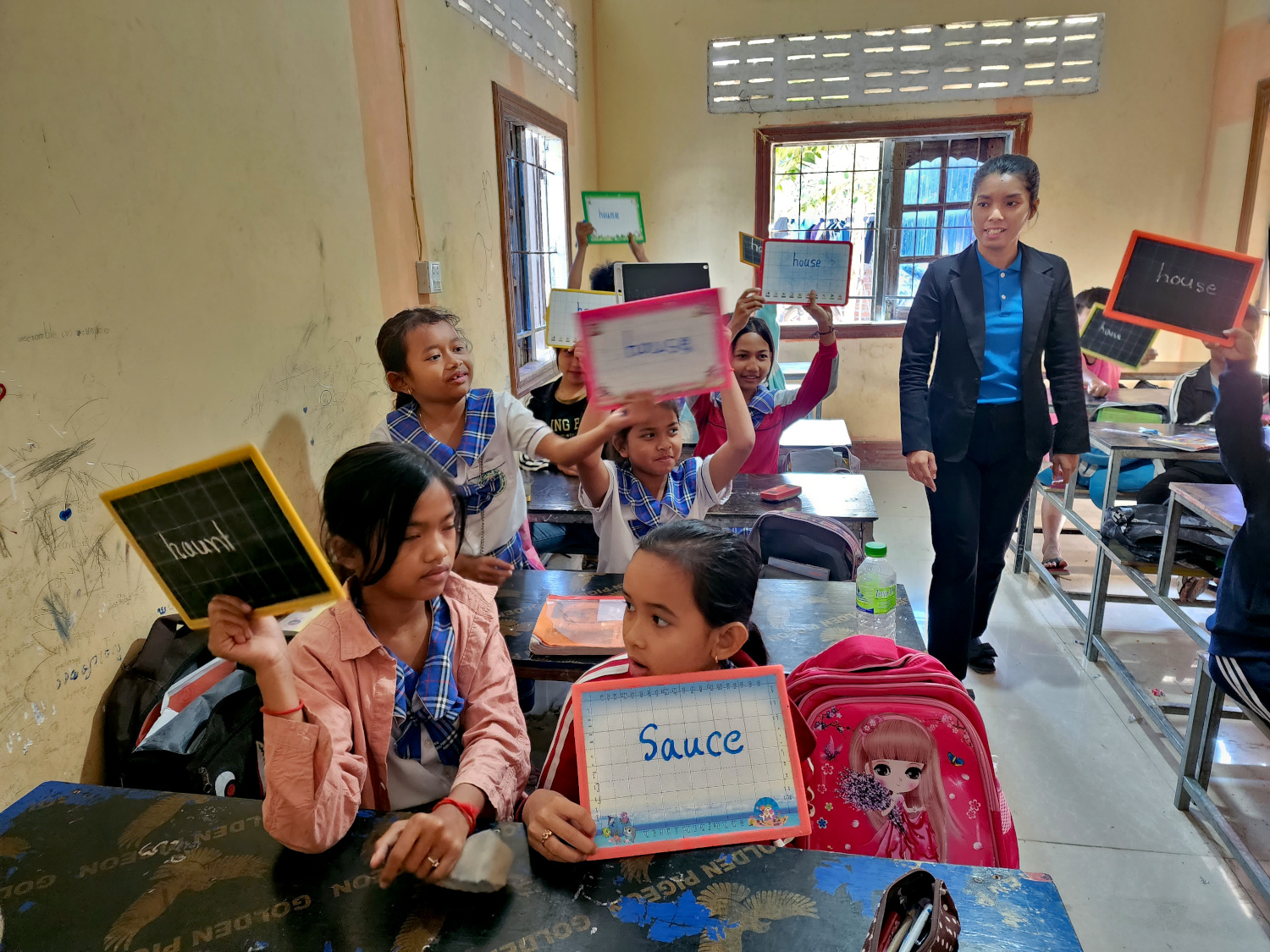 teaching students English in Phnom Sampov, Cambodia