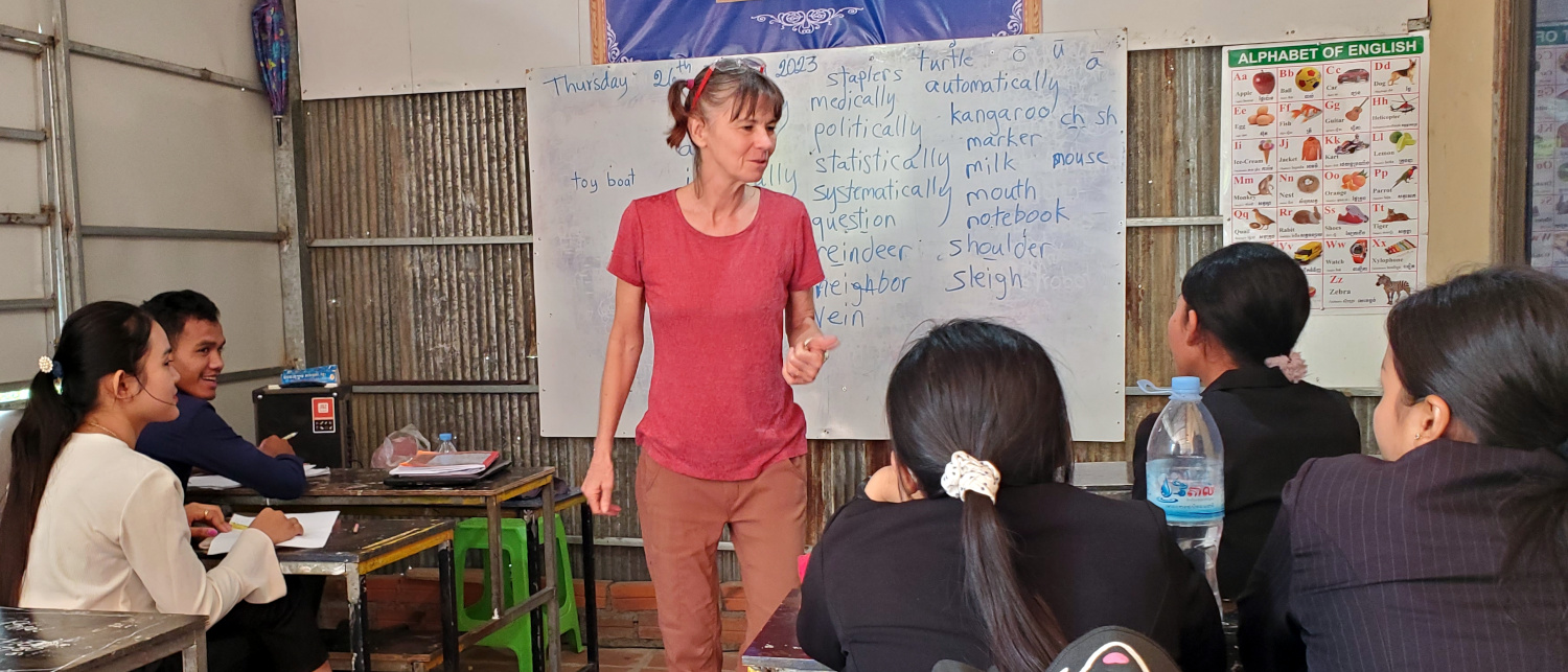 volunteer teaching Phnom Sampov, Cambodia - helping the teachers with English