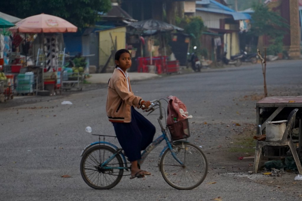 bicycle rider on street in Phnom Sampov